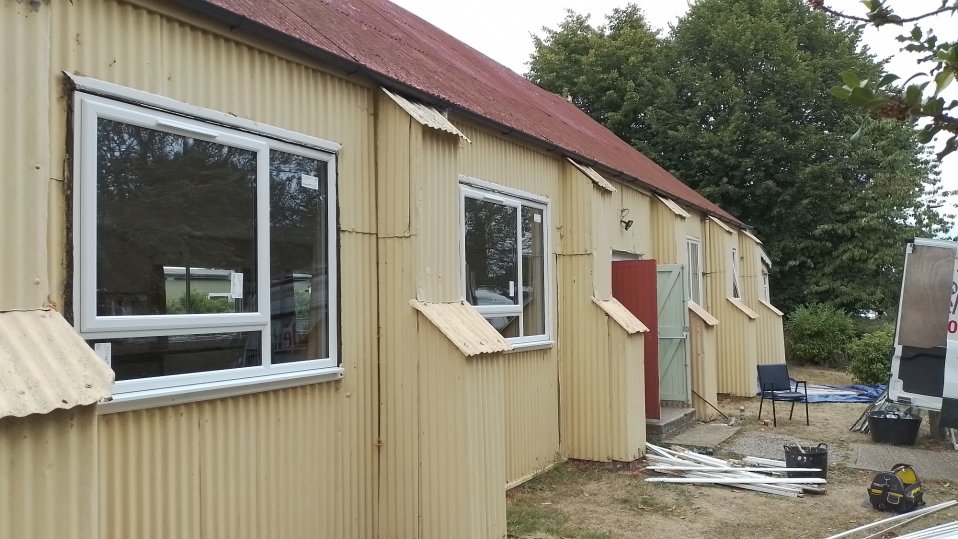 St Barnabas church hall with new windows being installed